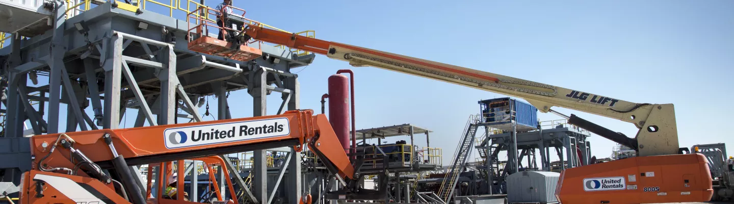 jobsite with boom lifts and forklifts 