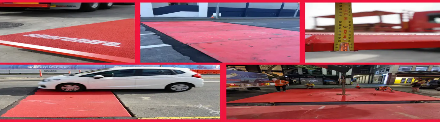Steel road plates or mats placed over a trench with a car passing safely above, ensuring temporary site access and safety.