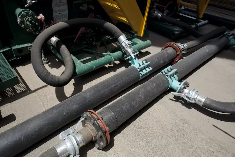 hoses and pipes on ground