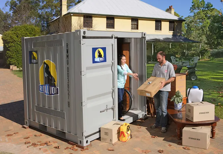 storage container loading with people 