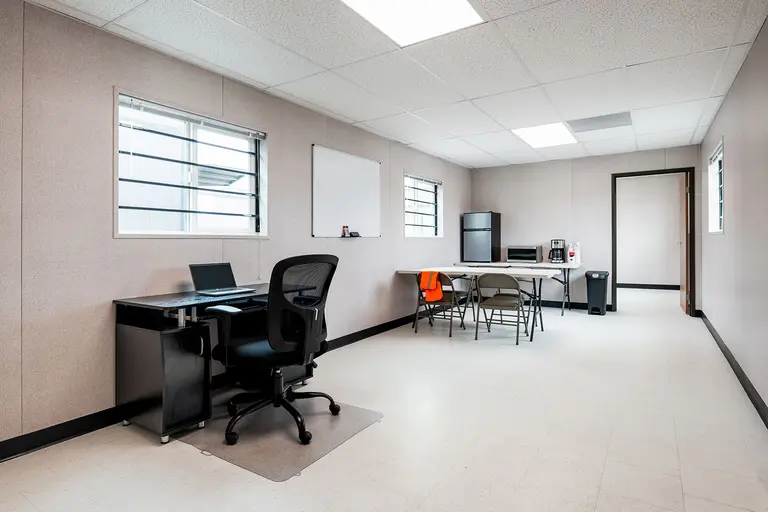 Office Container with a desk, chair, table, etc.