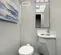 White Satellite 4-Station Restroom Trailer with 4 Sinks, interior