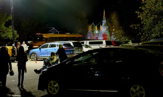 Light tower in use at event parking lot
