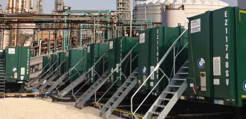 green tanks at refinery