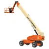 Side angled view of an orange and beige JLG boom lift, extended vertically with basket.