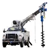 White Elliott 47 ft. Digger Derrick Truck